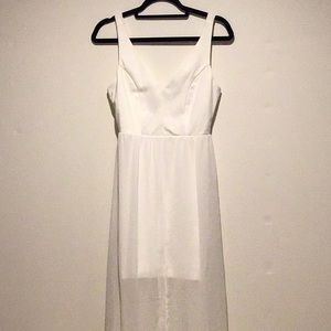 Sleeveless minidress with sheer overlay